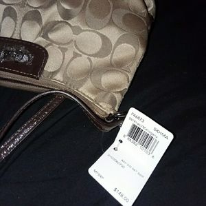 Brand New Coach monogram mini handbag